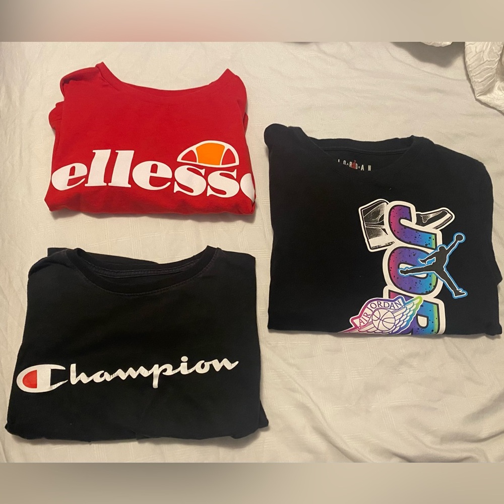 Shirt bundle: black JORDAN and CHAMPION tees with red ELLESSE cropped top